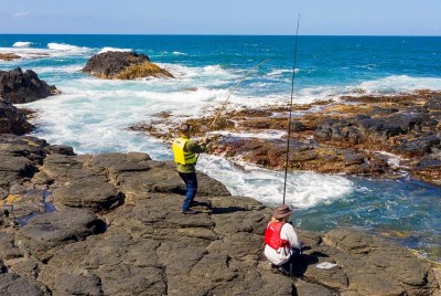 Rock fishers with compliant lifejackets.jpg